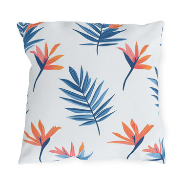 Decorative pillow with tropical leaf pattern on a white background